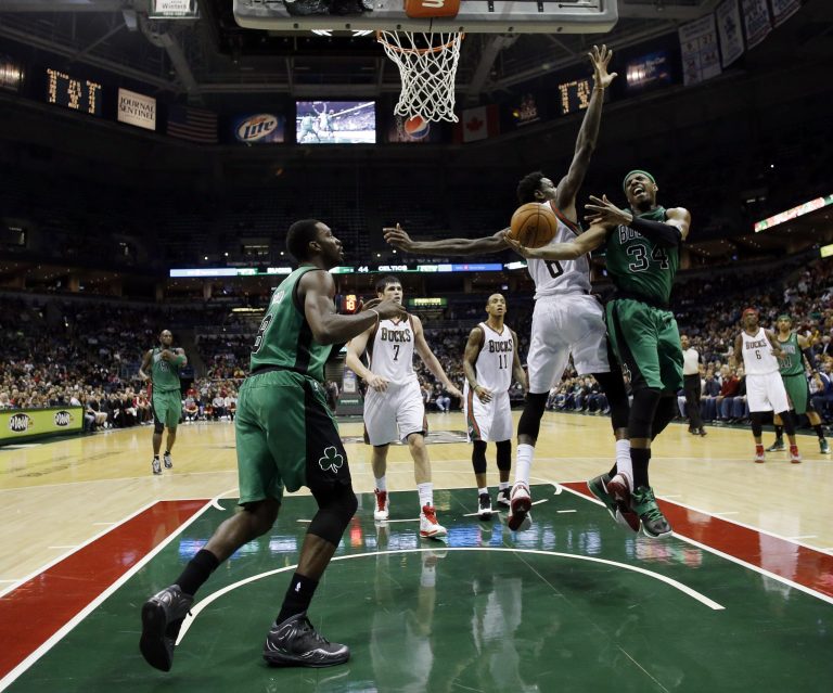   Boston Celtics' Paul Pierce (34) tries to drive to the basket past Milwaukee Bucks' Larry Sanders (8) during the first half of an NBA basketball game on Saturday, Dec. 1, 2012, in Milwaukee. (AP Photo/Morry Gash)  