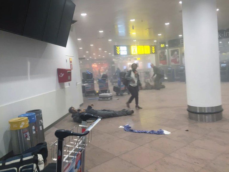 IA developing situation left a number dead in explosions that ripped through the departure hall at Brussels airport Tuesday, police said. All flights were canceled, arriving planes were being diverted and Belgium's terror alert level was raised to maximum, officials said. (Ketevan Kardava/ Georgian Public Broadcaster via AP)