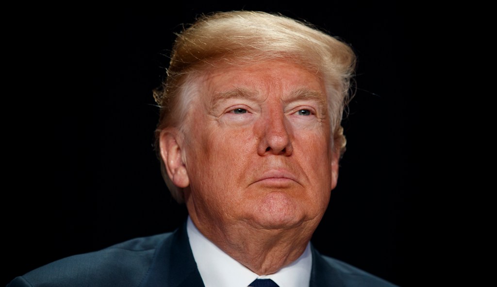 Trump signs spending bill to end 8-hour shutdown