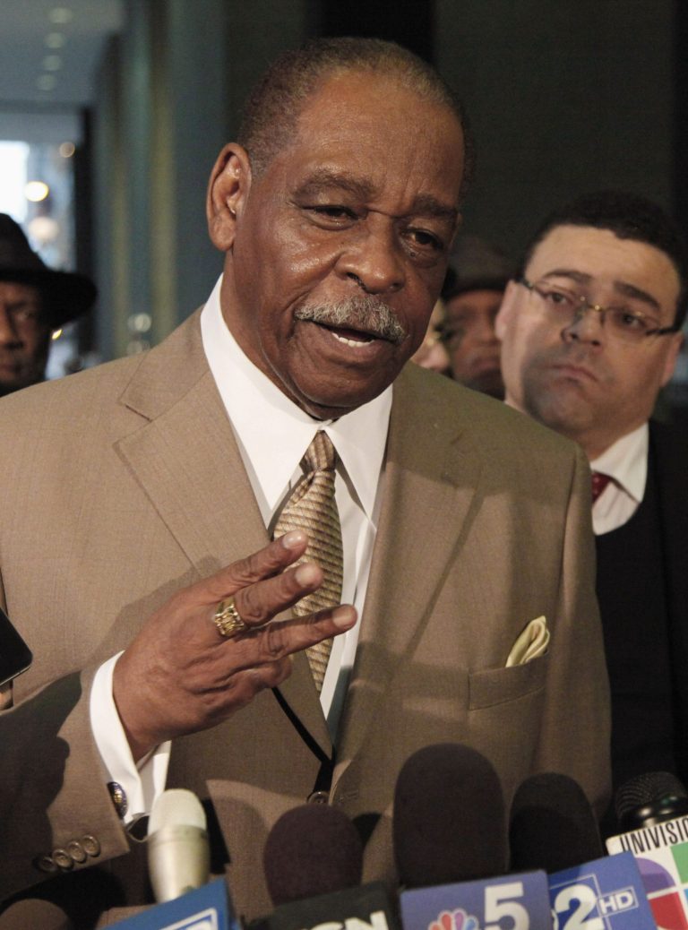   FILE - In this March 2, 2012 file photo, Cook County Commissioner William Beavers talks to reporters, as his attorney Sam Adam Jr. listens, after Beavers' arraignment on federal tax-evasion charges in Chicago. Jury selection in Beavers' trial begins Monday Dec. 3, 2012 in Chicago. The 77-year-old Democrat is accused of diverting tens of thousands of dollars from campaign accounts for personal use without reporting it as income on tax returns and of then attempting to cover up the deeds. (AP Photo/Charles Rex Arbogast, File)  