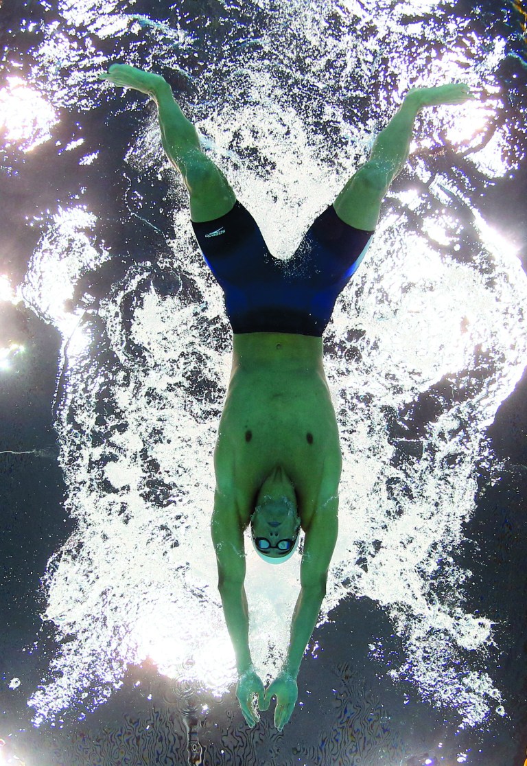 Lochte wins 400 IM in blowout; Phelps finishes 4th