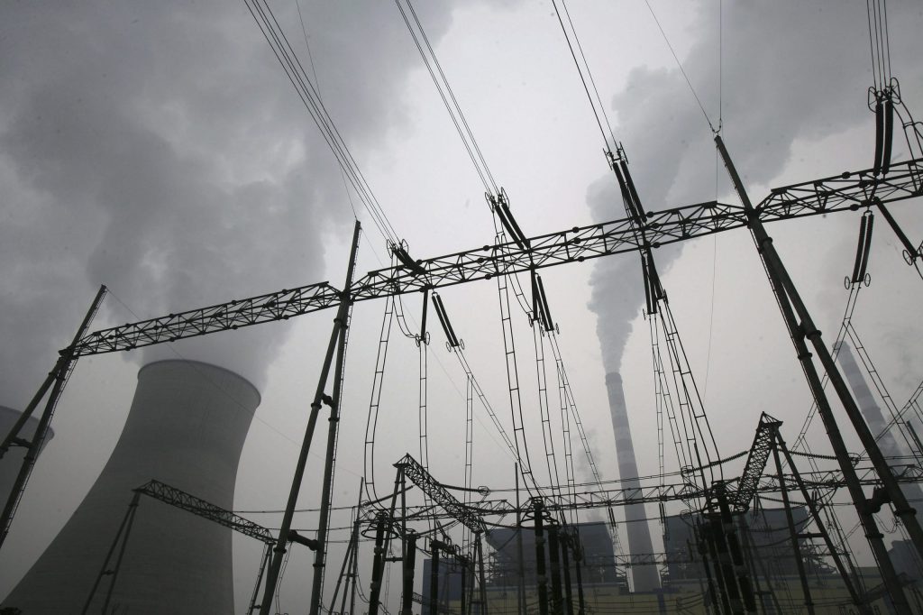 China announces move to restrict use of coal