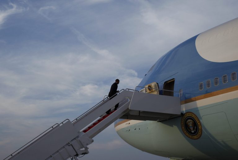 President Barack Obama boards Air Force One at Andrews Air Force Base, Md., as he begins his three-country trip to Poland, Belgium and France, Monday, June 2, 2014. (AP Photo/Charles Dharapak)