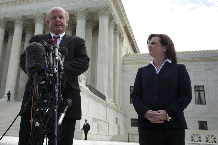 Lead counsel Michael Carvin speaks to members of the media in front of the U.S. Supreme Court as Susan B. Anthony List President Marjorie Dannenfelser looks on April 22, 2014 in Washington. (Photo by Alex Wong/Getty Images)