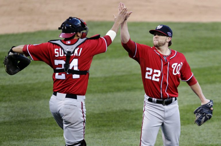 Tom Gannam/AP
Drew Storen earned a save in Game 1 as the Nationals beat the Cardinals on the road.