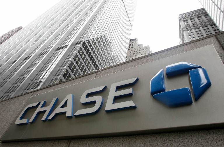 The eight biggest banks would have to raise too much capital and wouldn't get them out of international rules, the Congressional Budget Office said. (AP Photo/Kathy Willens, File)