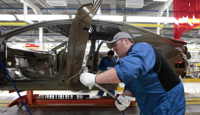 More companies will set up more business in the U.S., because it's now easier to compete by doing so thanks to the new tax law. (AP Photo/Paul Sancya)