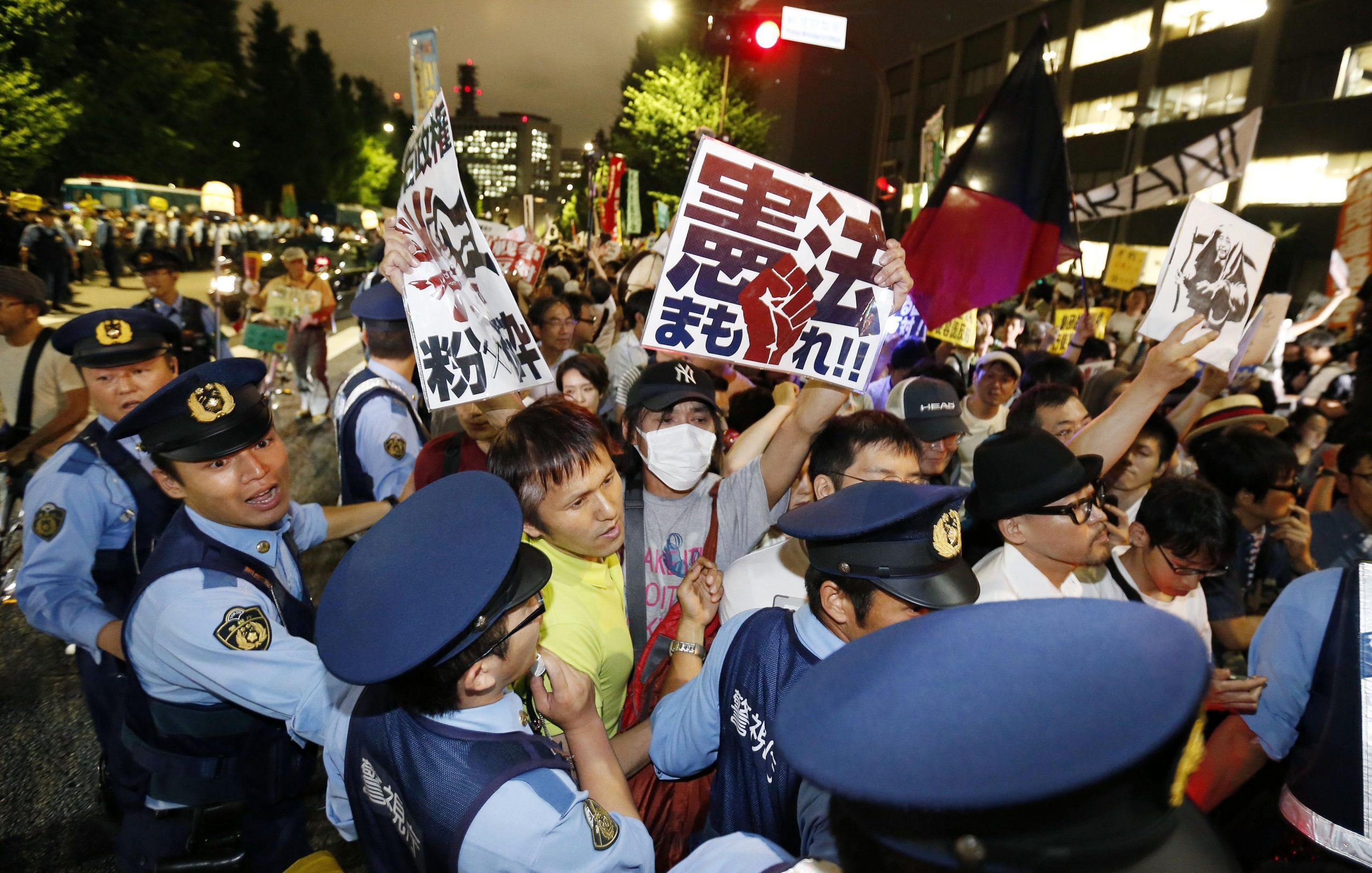 Thousands protest greater Japanese military role