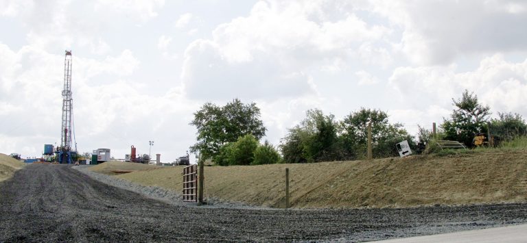 A crew works on a drilling rig at a well site for shale based natural gas on Monday, June 25, 2012 in Zelienople, Pa. Oil prices are expected to keep falling through 2013, trimming profits at some of the world's biggest petroleum companies and slowing a boom in North American production, analysts said Monday. Natural gas prices haven't fared much better: while higher since May, the price is still near 10-year lows. (AP Photo/Keith Srakocic)