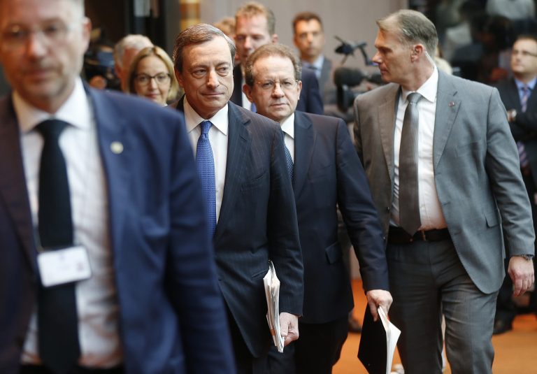 President of European Central Bank Mario Draghi listens to questions during a news conference in Frankfurt, Germany, Thursday,  June 5, 2014, following a meeting of the ECB governing council. The ECB lowered its main interest rate to 0.15 per cent. (AP Photo/Michael Probst)