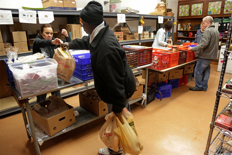 Many researchers see a flaw in the official income and poverty rate, namely that it only counts cash income and excludes some of the in-kind government benefits that have grown in recent years, such as food stamps. (AP Photo/M. Spencer Green)
