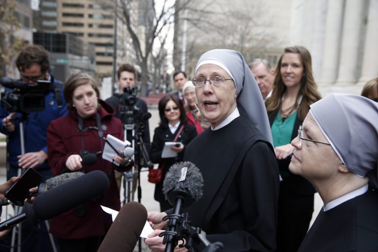 In this Dec. 8, 2014, file photo, Sister Loraine Marie Maguire, of Little Sisters of the Poor, speaks to members of the media after attending a hearing in the 10th U.S. Circuit Court of Appeals, in Denver, Colo.