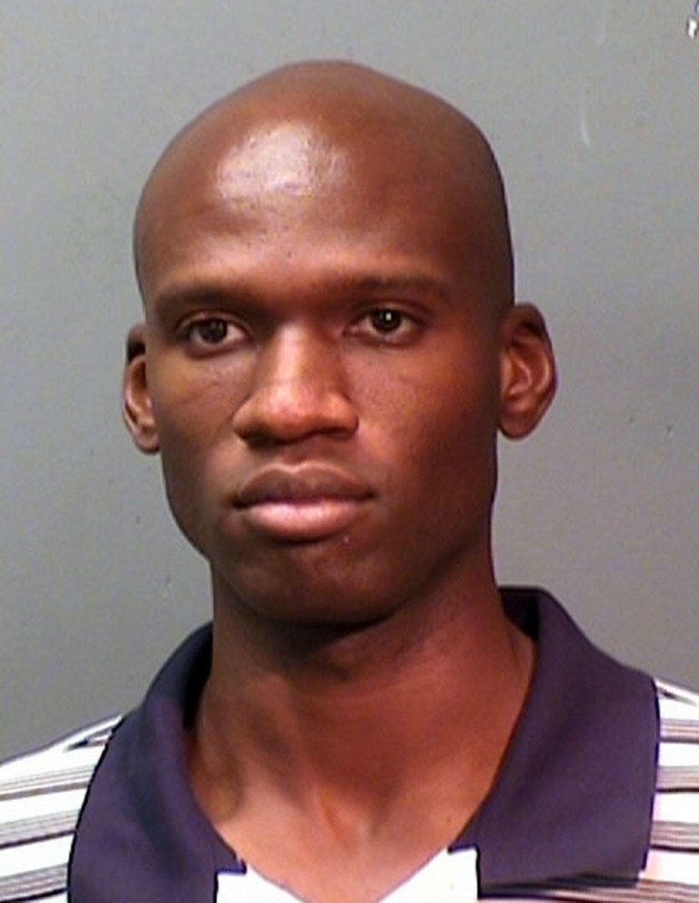   FILE - This 2010 booking file photo provided by the Fort Worth Police Department shows Aaron Alexis, the gunman in the Monday, Sept. 16, 2013 shooting rampage at at the Washington Navy Yard that left thirteen dead, including himself. Alexis lied about a previous arrest when he applied for a security clearance in the Navy, and also failed to disclose thousands of dollars in debts, according to Navy report released Monday, Sept. 23, 2013. (AP Photo/ Fort Worth Police Department, File)  