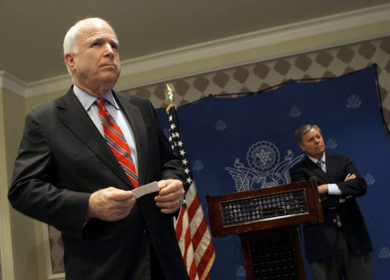   FILE - In this Aug. 6, 2013 file photo, Sen. John McCain, R-Ariz., left, and by Sen. Lindsey Graham, R-S.C. listen during a news conference in Cairo, Egypt. The US is sending confused message about Egypt. McCain gets OK from White House to go to Egypt, then goes and holds news conference spouting views contrary to administration. Local media in Egypt reporting that McCain and el-Sissi had confrontations over the issues. Meanwhile deputy Secretary of State Bill Burns is in Egypt, forbidden to talk to Morsi, while meeting with minor Brotherhood officials and the military. This after Kerry said the military was ârestoring democracyâ by ousting democratically elected president. (AP Photo/Amr Nabil, File)  
