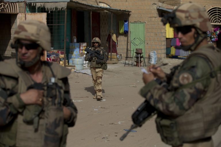 French soldiers patrol through the central market in Timbuktu, Mali. (AP/Rebecca Blackwell,)