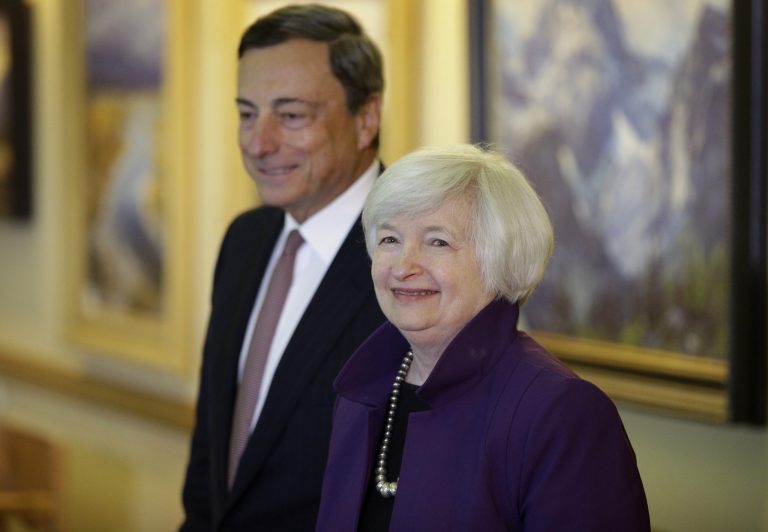 Federal Reserve Chair Janet Yellen, right, and European Central Bank President Mario Draghi walk together during the Jackson Hole Economic Policy Symposium at the Jackson Lake Lodge in Grand Teton National Park near Jackson, Wyo. Friday, Aug. 22, 2014. (AP Photo/John Locher)