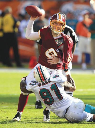 Wilfredo Lee/AP
Quarterback Rex Grossman started for the first time in four games but threw two interceptions in the Redskins'loss.
