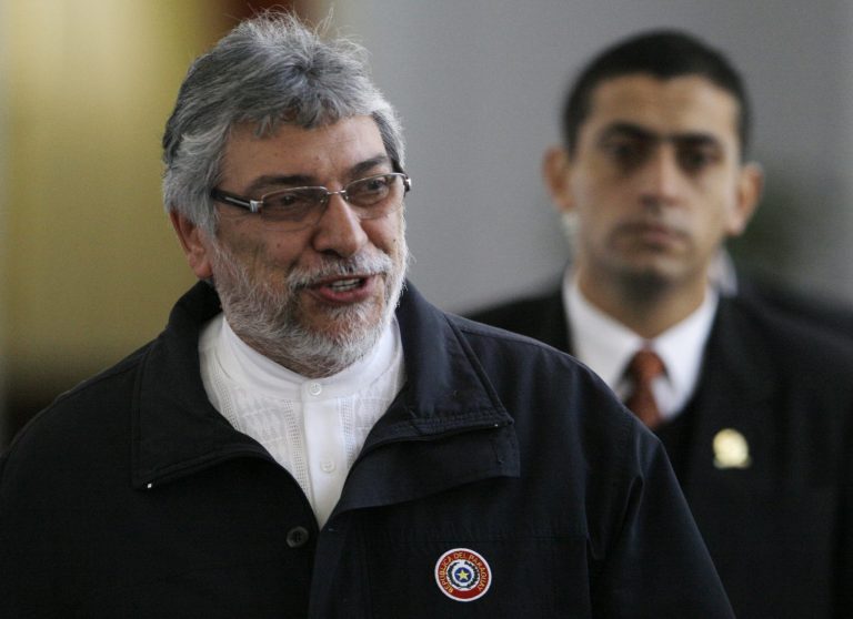  Paraguay's President Fernando Lugo leaves the government palace in Asuncion, Paraguay, Tuesday, June 5, 2012. Lugo has recognized another love-child. This time it's a 10-year-old boy, born to nurse Narcisa de la Cruz de Zarate in the northern state where Lugo served as a Catholic bishop before renouncing the priesthood and turning to politics. De la Cruz is the fourth woman to have filed a paternity suit against the 61-year-old former cleric. (AP Photo/Jorge Saenz)  