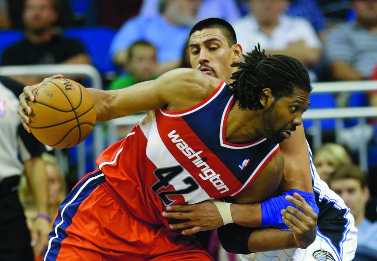 John Raoux/AP
Wizards veteran Nene is being limited to about 20 minutes a game off the bench after coming off a foot injury in the preseason.