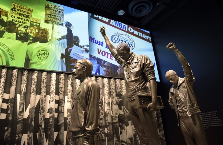 A statue of the 1968 Olympics Black Power salute is on display at the National Museum of African American History and Culture in Washington, Wednesday, Sept. 14, 2016, during a press preview. (AP Photo/Susan Walsh)