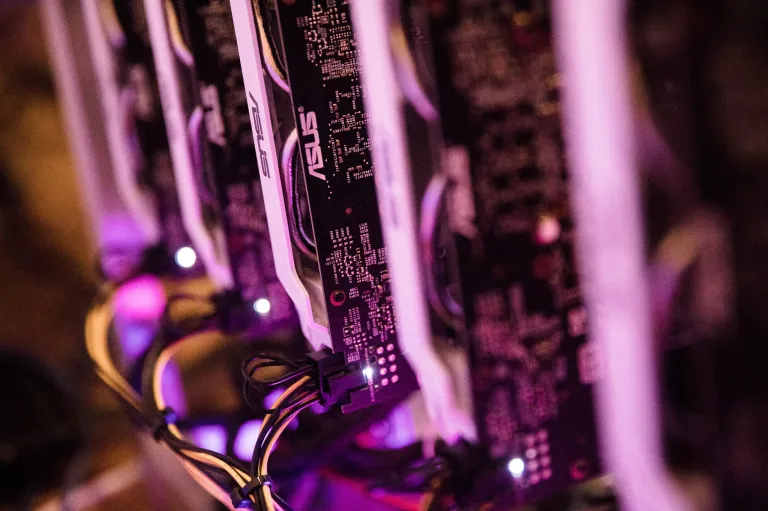 Nvidia Corp. graphic processing units sit stacked inside a 'mining rig' computer, used to generate the Ethereum cryptocurrency, in Budapest, Hungary in January. U.S. securities regulators say adequate oversight of cryptocurrency markets may require new tools from Congress. Photographer: Akos Stiller/Bloomberg