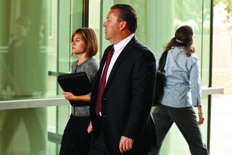 FBI Special Agent in Charge in Phoenix, James Turgal, front, arrives at U.S. District Court prior to the sentencing of Jared Lee Loughner, Thursday, Nov. 8, 2012, in Tucson, Ariz. Loughner, who killed six people and wounded 13 others in an Arizona shooting rampage, is to be sentenced Thursday at a hearing that some victims of the attack, including former Rep. Gabrielle Giffords, are expected to attend. Loughner has pleaded guilty to federal charges in the January 2011 attack at a Giffords political event in Tucson.(AP Photo/Ross D. Franklin)