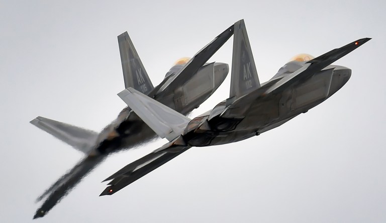 The Russian jets immediately left the area after the intercept and warning flares from the F-22s, an official confirmed. (U.S. Air Force photo/Justin Connaher)