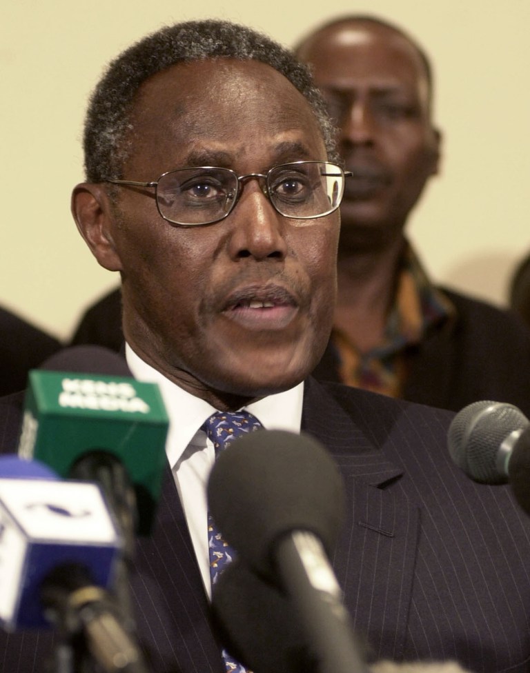   FILE - Former Kenyan Vice President George Saitoti addresses a news conference in Nairobi hours after being fired by President Daniel arap Moi in this Aug. 30, 2002 file photo. Kenyan police said Sunday June 10, 2012 Security Minister George Saitoti who once served as Kenya's vice president has been killed in a helicopter crash near the capital. (AP Photo/Khalil Senosi)  