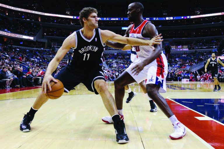 Rob Carr/Getty Images
Emeka Okafor and the Wizards held the Nets' Brook Lopez to 3-for-11 shooting Friday, his worst performance of the season.
