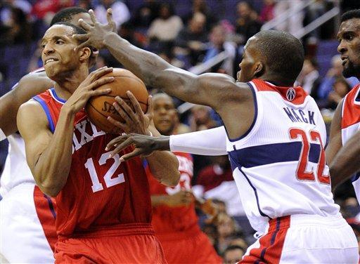 Wizards look new, play old in preseason opener