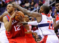 Wizards look new, play old in preseason opener