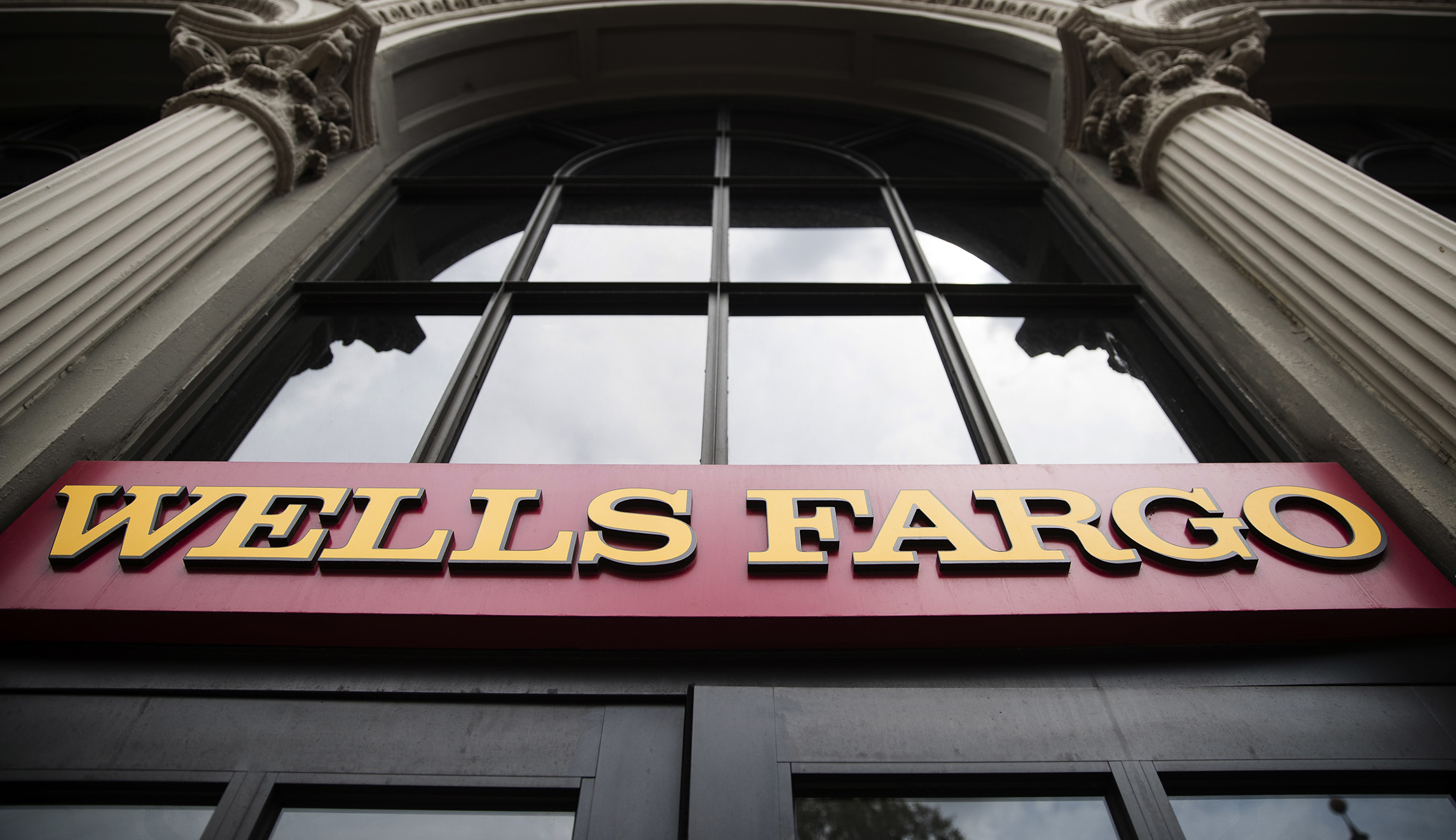 Federal Reserve slaps punishments on Wells Fargo for creating false accounts