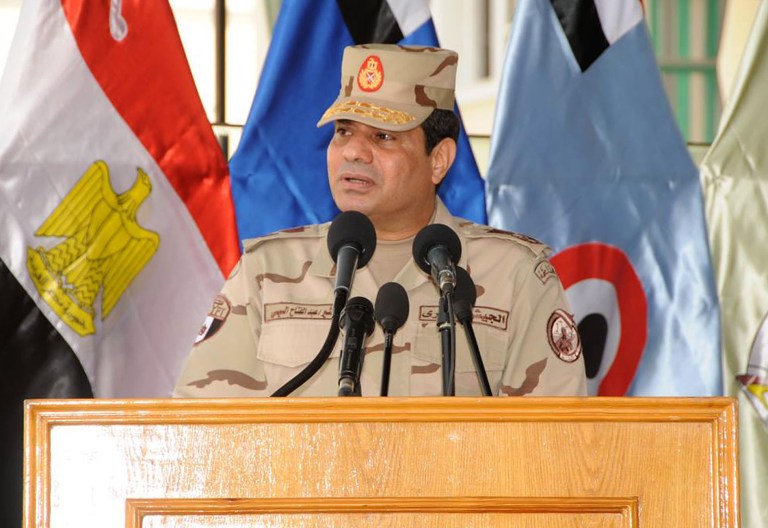 This image posted on the official Facebook account of Egypt's military spokesman shows Field Marshal Abdel-Fattah el-Sissi addressing cadets at a military academy in Cairo, Egypt, Tuesday, March 4, 2014. He gave his strongest indication yet that he intends to enter presidential elections, saying in the speech that he 