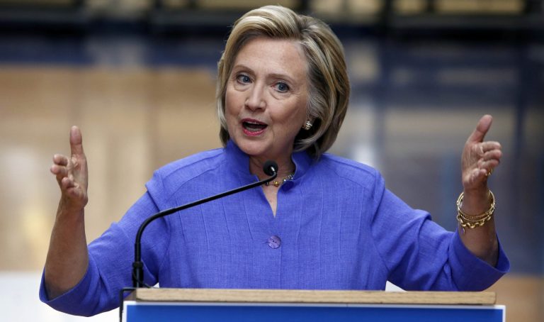 Democratic presidential candidate Hillary Clinton answers reporters questions at an event in Exeter, N.H. (AP Photo/Jim Cole)