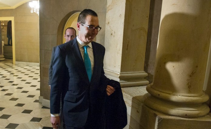 Former Goldman Sachs banker will face questions about taxes, financial regulation and the federal debt. (AP Photo/Cliff Owen)