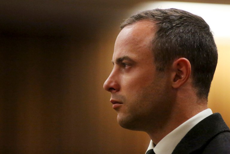 FILE - In this Tuesday, May 20, file photo, Oscar Pistorius listens as a court ruling is handed down that he would undergo psychiatric evaluation in Pretoria, South Africa. The murder trial of Pistorius resumes Monday, June 30, 2014 after one month during which mental health experts evaluated the athlete to determine if he has an anxiety disorder that could have influenced his actions on the night he killed girlfriend Reeva Steenkamp. (AP Photo/Siphiwe Sibeko, Pool, File)