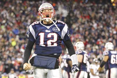 Jim Rogash/Getty Images
In the AFC title game, Tom Brady failed to throw a touchdown in a playoff game for the first time since 2001.