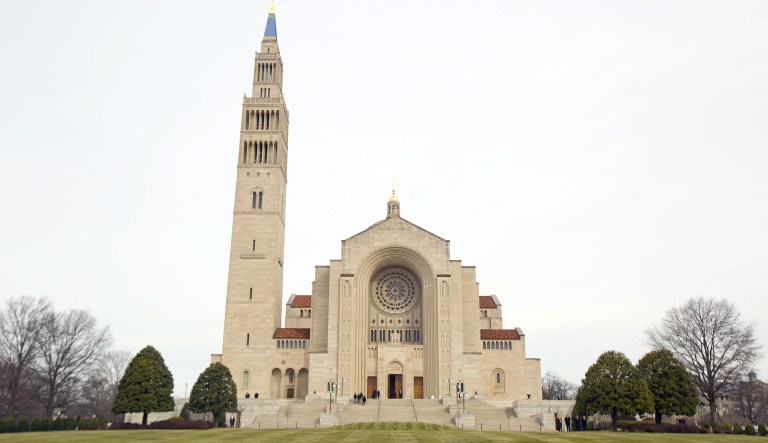 Leaders of Rhode Island's Healing Church said they are backing out of the plan at the National Shrine of the Immaculate Conception, about three miles from the U.S. Capitol, after being assailed by counterprotesters during a free speech rally in Boston. (AP Photo/Pablo Martinez Monsivais)