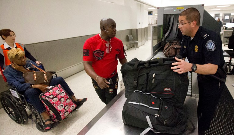 The challenge with the current approach by U.S. Customs and Border Protection is that it sets a very bad first impression for folks who have decided to come here for their annual vacation. (AP Photo/Wilfredo Lee)