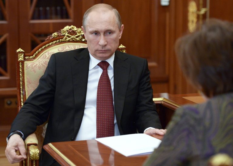 Russian President Vladimir Putin meets with Khanty-Mansiysk Governor Natalya Komarova in the Kremlin in Moscow, Russia, Friday, June 20, 2014. (AP Photo/RIA-Novosti, Alexei Nikolsky, Presidential Press Service)