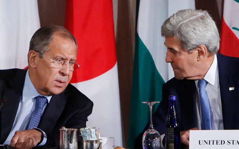 Secretary of State John Kerry is continuing to talk to his Russian counterpart, Russian Foreign Minister Sergei Lavrov, about the crisis in Syria, even after the U.S. formally suspended bilateral talks due to Russia's determination to support attacks on civilians. (AP Photo/Jason DeCrow)