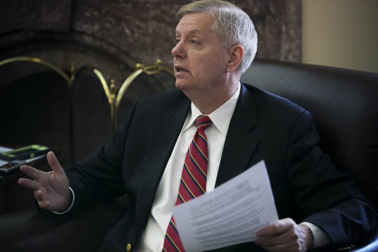 Sen. Lindsey Graham, R-S.C., holds a pen and pad while meeting with reporters on Capitol Hill in Washington, Wednesday, April 22, 2015. (Graeme Jennings/Examiner)