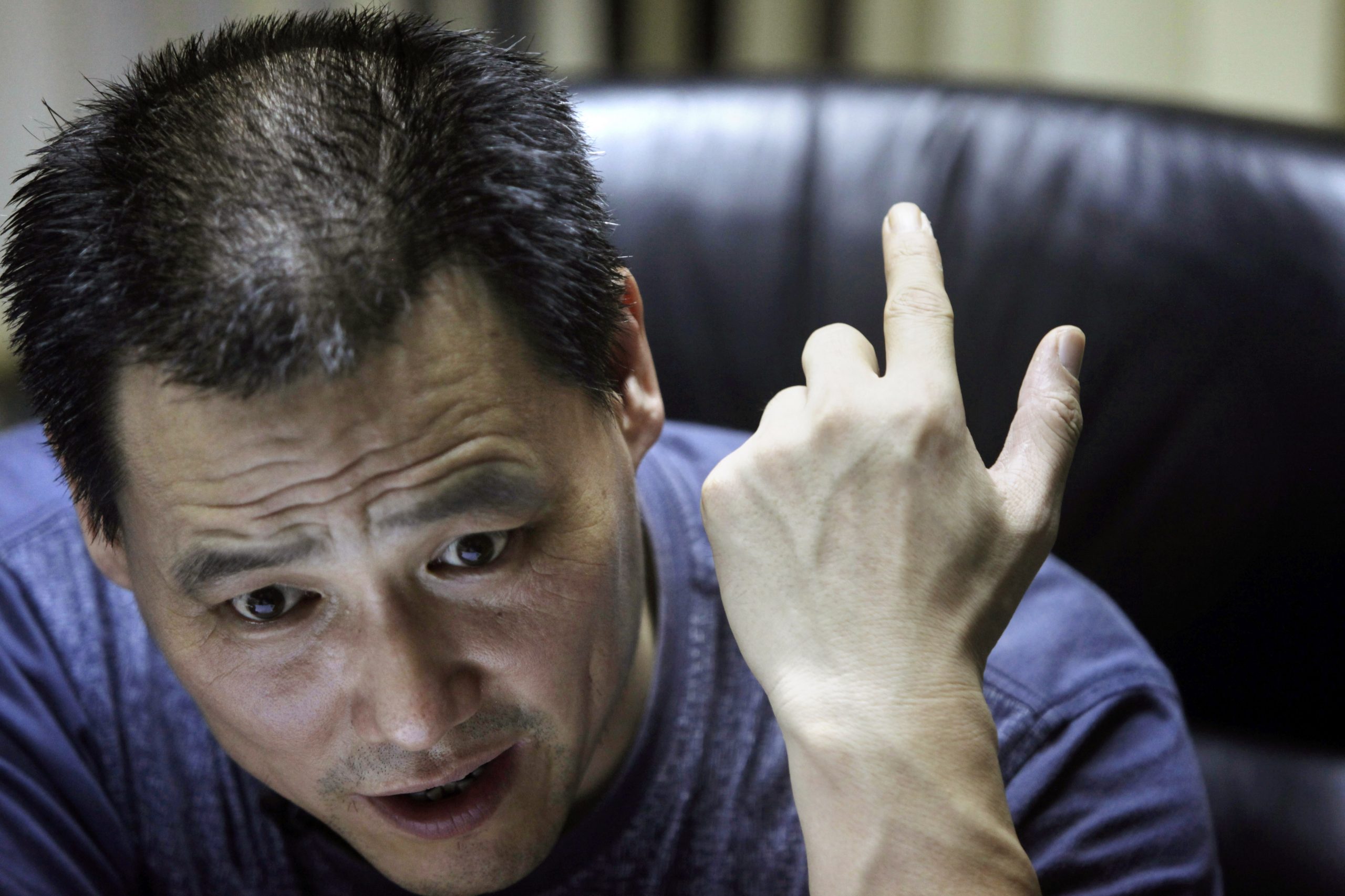 China arrests rights lawyer who fought labor camps