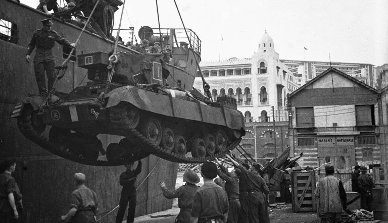 A Valentine tank is unloaded from a convoy ship in Algiers, Algeria, in November 1942. The Allied Expedition Force's Operation Torch was launched on Nov. 8, 1942, with numerous successful landings along the Algerian coast. (AP Photo)