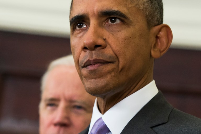 Vice President Joe Biden listens at left as President Obama speaks about the Islamic State group, Wednesday, Feb. 11, 2015, in the Roosevelt Room of the White House in Washington. (AP Photo/Evan Vucci)
