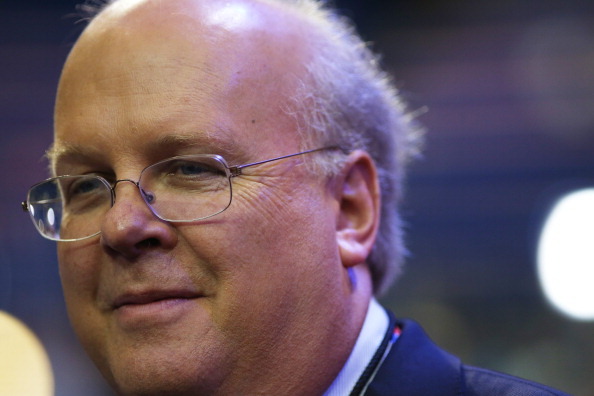 TAMPA, FL - AUGUST 28:  Karl Rove, former Deputy Chief of Staff and Senior Policy Advisor to U.S. President George W. Bush, walks on the floor before the start of the second day of the Republican National Convention at the Tampa Bay Times Forum on August 28, 2012 in Tampa, Florida. Today is the first full session of the RNC after the start was delayed due to Tropical Storm Isaac.  (Photo by Spencer Platt/Getty Images)