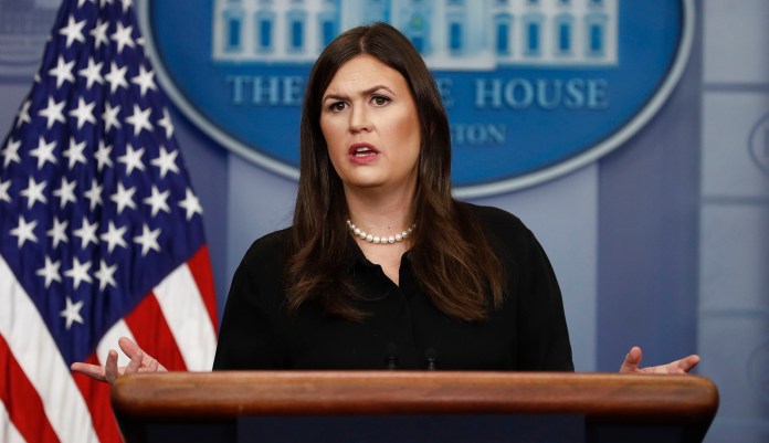 White House press secretary Sarah Sanders accused ESPN of being "hypocritical" for not punishing anchor Jemele Hill after she called President Trump a white supremacist and "unfit" for the presidency. (AP Photo/Carolyn Kaster)