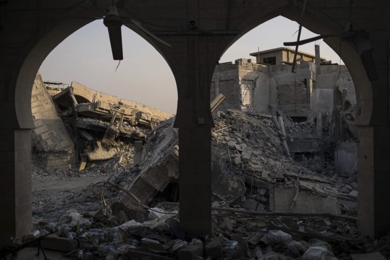 In this July 9, 2017 photo, destroyed buildings sit on the Old City of Mosul, Iraq. Iraq's U.S.-backed forces succeeded in wresting Mosul from the Islamic State group but at the cost of enormous destruction. The nearly 9-month fight culminated in a crescendo of devastation _ the blasting of the historic Old City to root out the militants' final pockets.(AP Photo/Felipe Dana)
