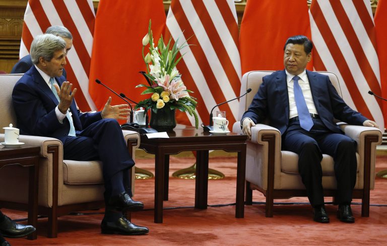 U.S. Secretary of State John Kerry meets with China's President Xi Jinping, right, at the Great Hall of the People in Beijing Thursday, July 10, 2014. (AP Photo/Jim Bourg, Pool)