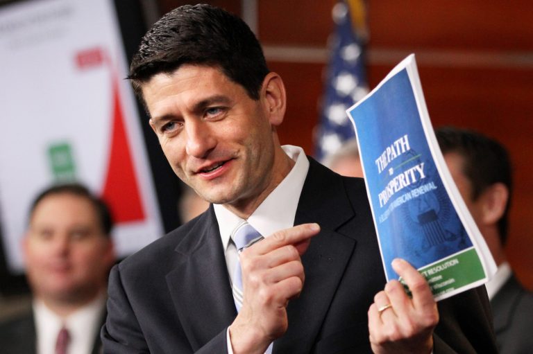   FILE - In this March 20, 2012 file photo, House Budget Committee Chairman Rep. Paul Ryan, R-Wis., holds up a copy of his budget plan entitled 
